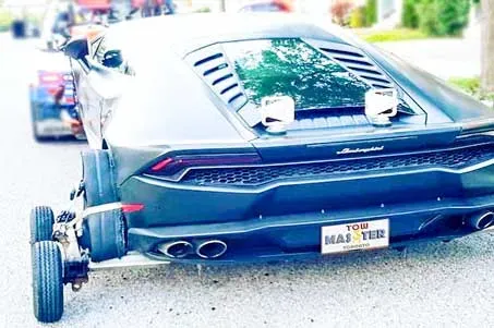 Wheel lift or dollies or wrecker towing service